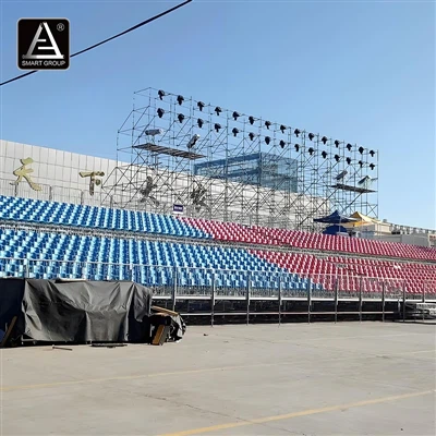 How are grandstands protected from fires?